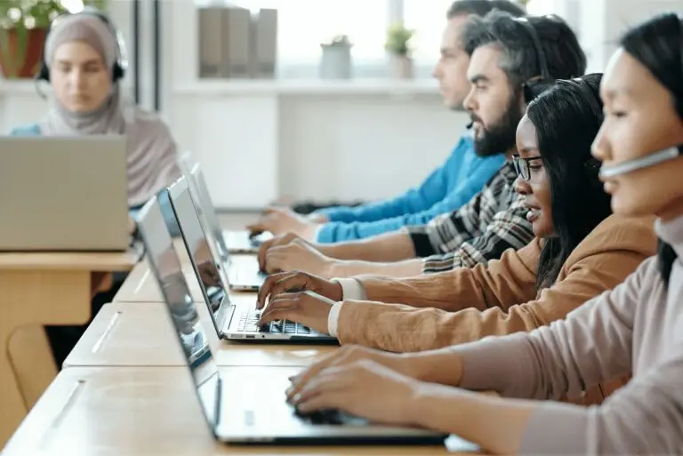 Group of people answering calls
